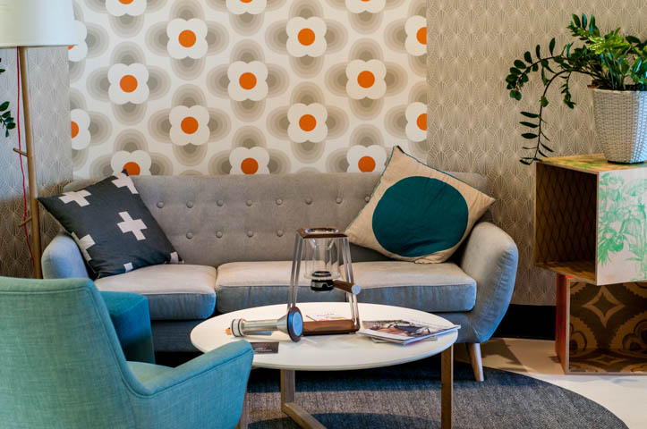 trinity coffee machine sits on table in lounge