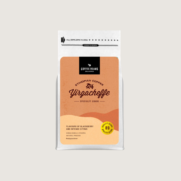 An Ethiopian Yirgacheffee coffee beans logo design on a label for a bag of coffee with sandy background colours and shapes 