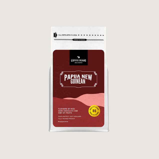 papua new guinea coffee beans single origin logo with deep reds and pinks wavy shapes and coffee descriptions