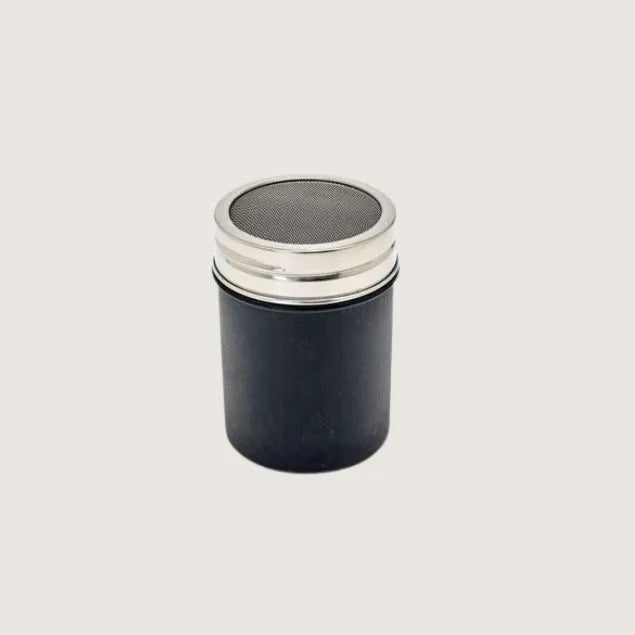 Black chocolate shaker coffee equipment with stainless steel casing around lid and mesh top