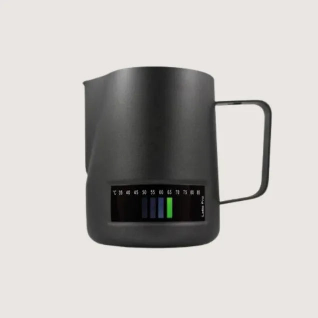 black espresso machine milk jug with built in thermometer showing temperature reading